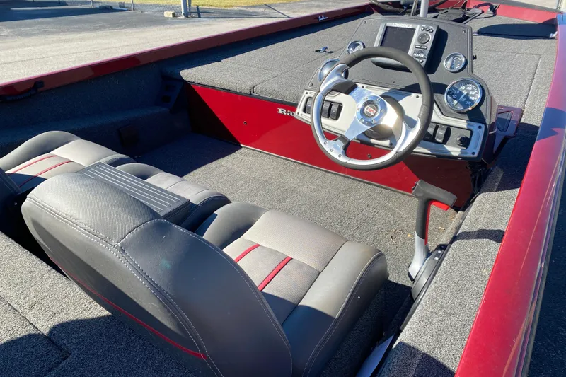 Slide: The Image of 2017 Ranger RT188 boat interior with steering wheel and dashboard controls. - 27