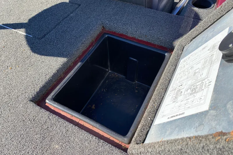 Slide: The Image of 2017 Ranger RT188 boat storage compartment with carpeted deck and schematic diagram. - 32