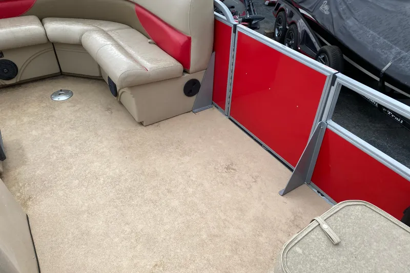 Slide: The Image of 2018 Bentley Pontoons 200 Fish interior with beige and red seating. - 16