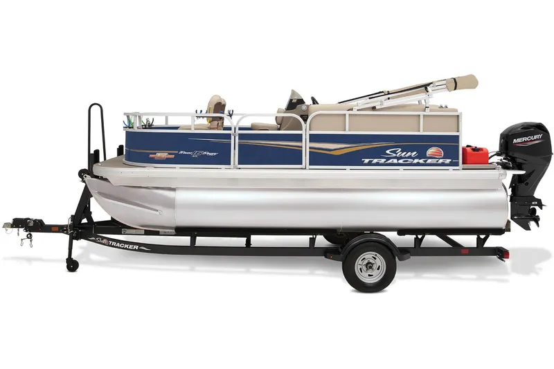 Slide: The Image of 2023 Sun Tracker Bass Buggy 16 XL Select pontoon boat on trailer, parked outdoors. - 3
