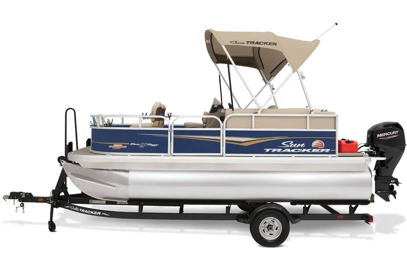 Slide: The Image of 2023 Sun Tracker Bass Buggy 16 XL Select pontoon boat on trailer, outdoor setting. - 5