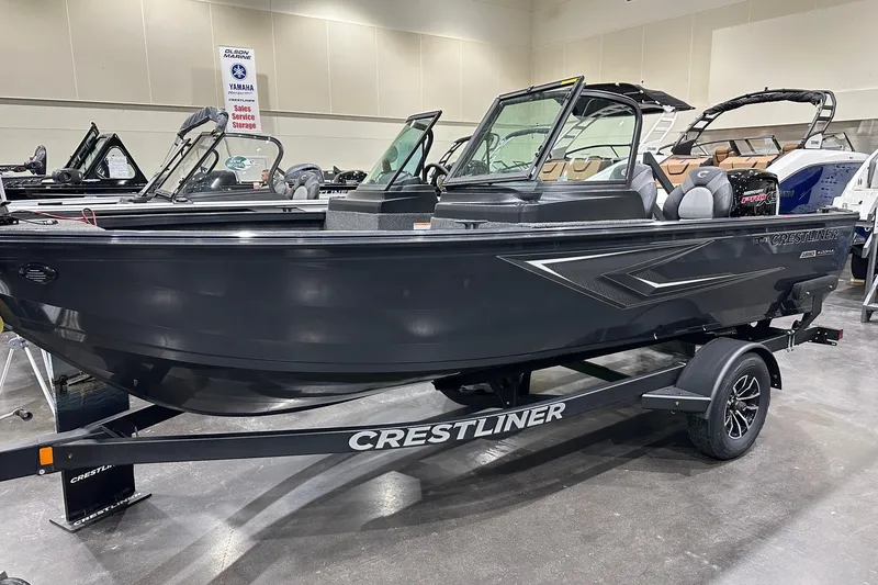 The Image of 2026 Crestliner 1850 Kodiak WT boat on trailer in showroom. - 0