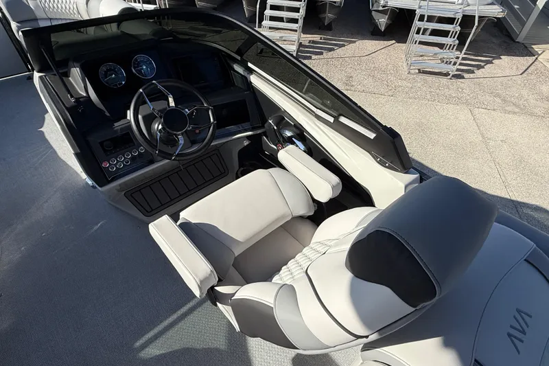 Slide: The Image of Luxurious helm of 2026 Avalon 2585 Catalina Windsheild, featuring modern controls and plush seating. - 21