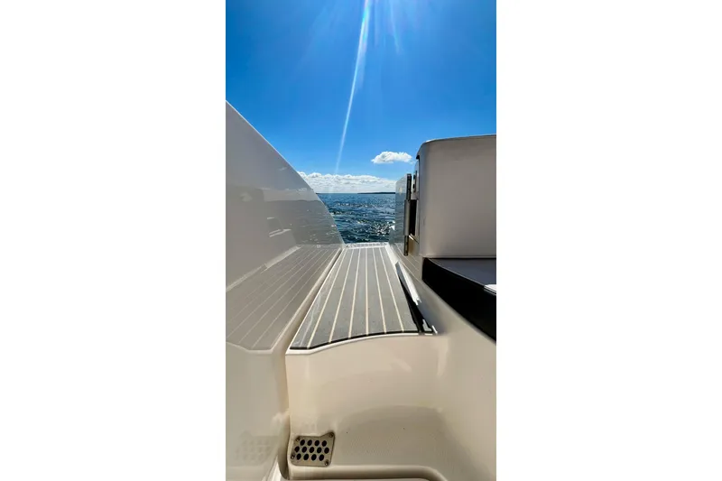 Slide: The Image of 2019 Chaparral 347 SSX boat interior with sleek seating and modern design. - 21