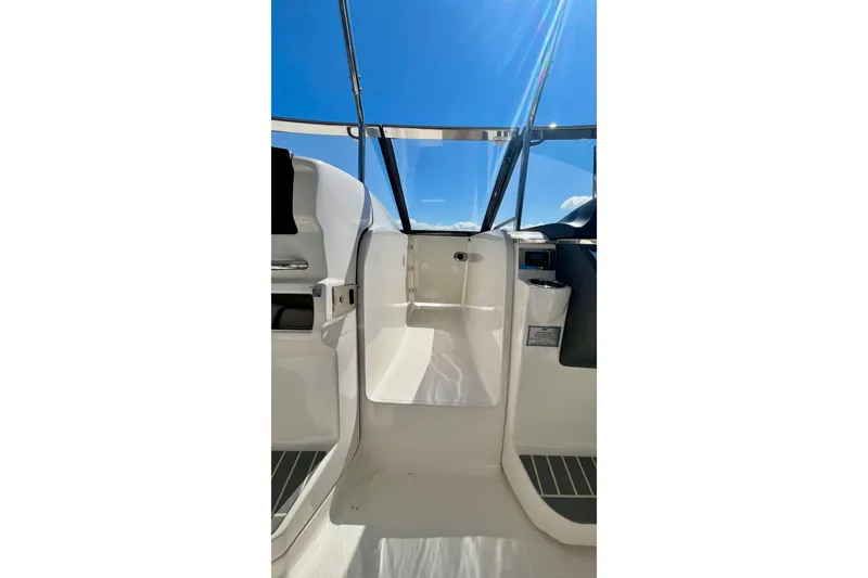 Slide: The Image of 2019 Chaparral 347 SSX boat interior with scenic lake view. - 25