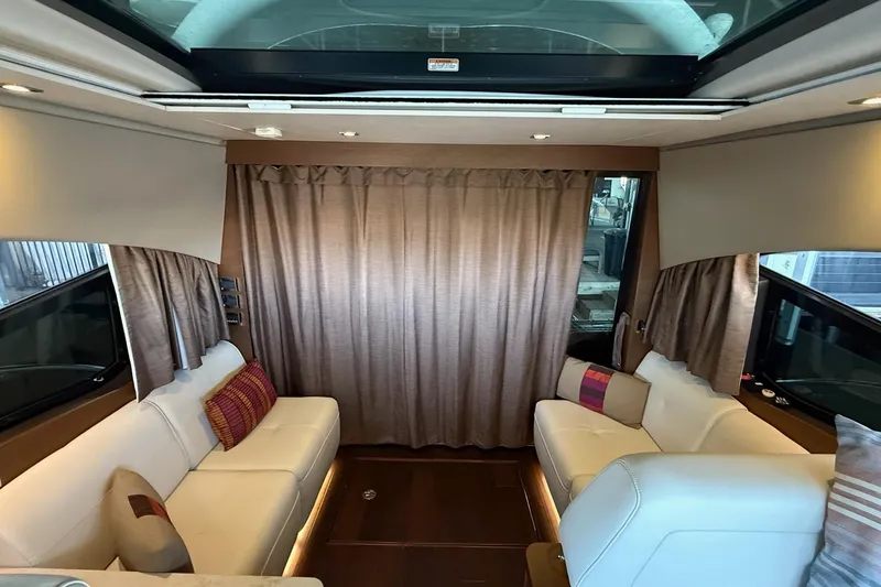 Slide: The Image of Luxurious interior of 2015 Sea Ray 470 Sundancer yacht with plush seating and elegant decor. - 22