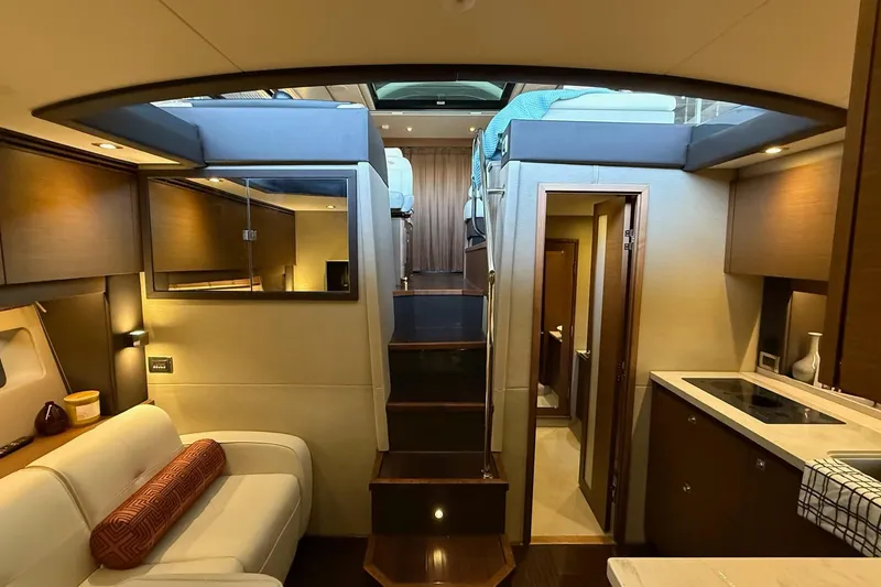 Slide: The Image of Luxurious interior of 2015 Sea Ray 470 Sundancer yacht with modern amenities and elegant design. - 27