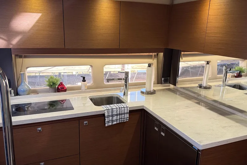 Slide: The Image of Luxurious kitchen interior of 2015 Sea Ray 470 Sundancer yacht with modern amenities. - 29