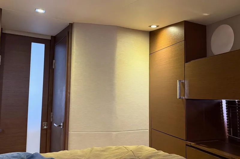 Slide: The Image of Interior cabin of 2015 Sea Ray 470 Sundancer yacht with modern wood finish. - 34