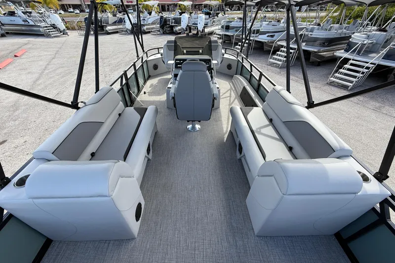 Slide: The Image of 2026 Avalon 2385 Venture 85 Tri Toon boat with spacious seating and center console. - 11
