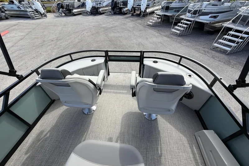 Slide: The Image of 2026 Avalon 2385 Venture boat with center console, dual seats, and high-performance tri-toon design. - 13