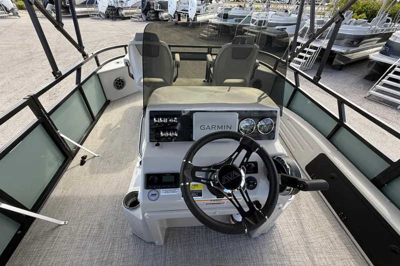Slide: The Image of 2026 Avalon 2385 Venture Center Console Fish boat interior with Garmin navigation system. - 19