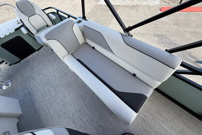 Slide: The Image of Luxurious seating on 2026 Avalon 2385 Venture 85 Tri Toon boat, featuring sleek design and comfort. - 21