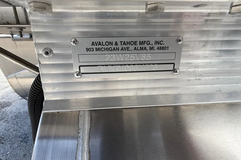 Slide: The Image of Avalon 2385 Venture 85 boat identification plate, showcasing manufacturing details and serial number. - 26