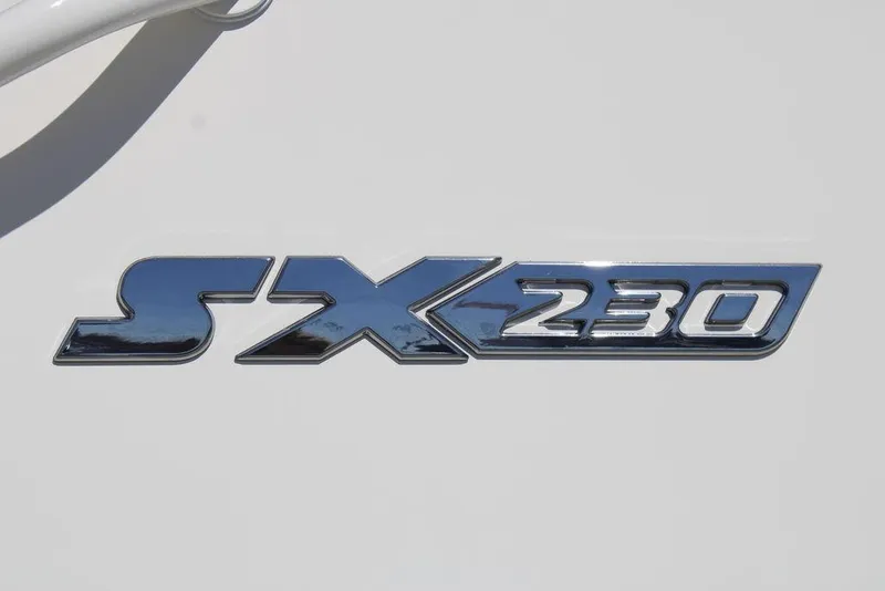 Slide: The Image of 2026 Skeeter SX230 logo on white background, chrome finish. - 10