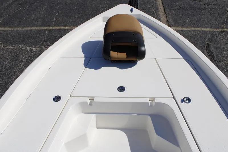 Slide: The Image of 2026 Skeeter SX230 boat console with steering wheel and controls. - 17