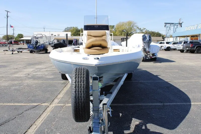 Slide: The Image of 2026 Skeeter SX230 boat side view with logo on trailer. - 2
