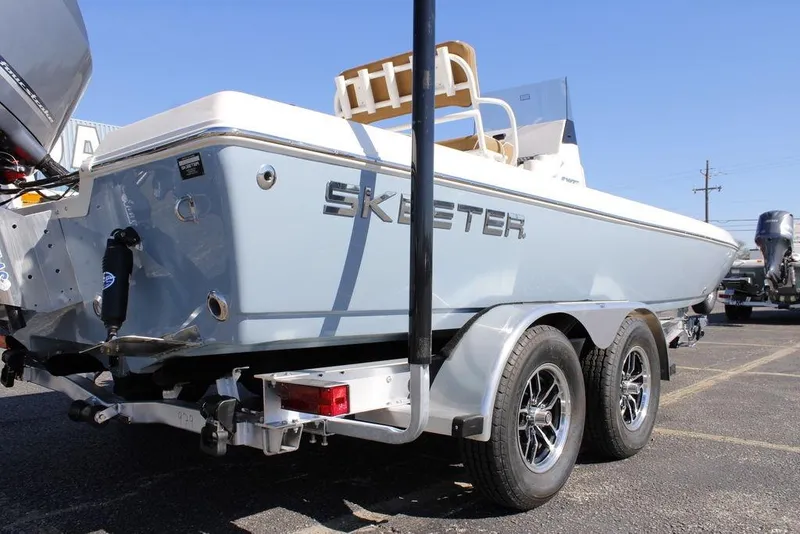 Slide: The Image of Close-up of 2026 Skeeter SX230 boat with Atlas hydraulic jack plate. - 24