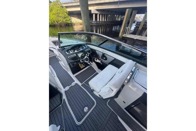 Slide: The Image of 2017 Monterey 298SS Super Sport boat interior with sleek dashboard and seating. - 10