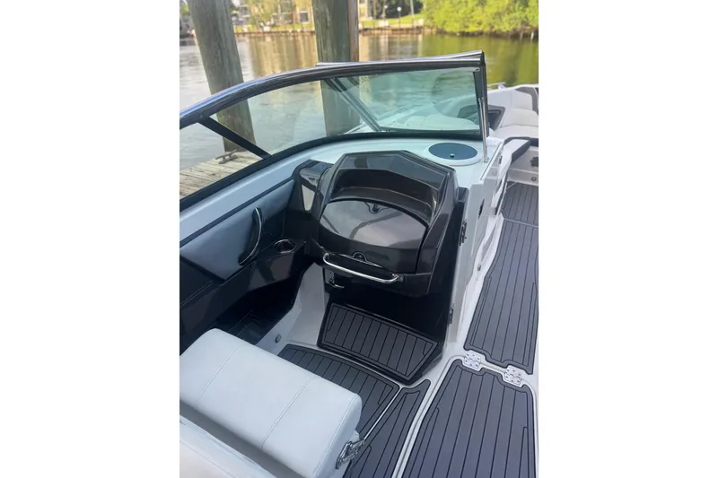 Slide: The Image of 2017 Monterey 298SS Super Sport boat interior with sleek seating and modern dashboard design. - 12