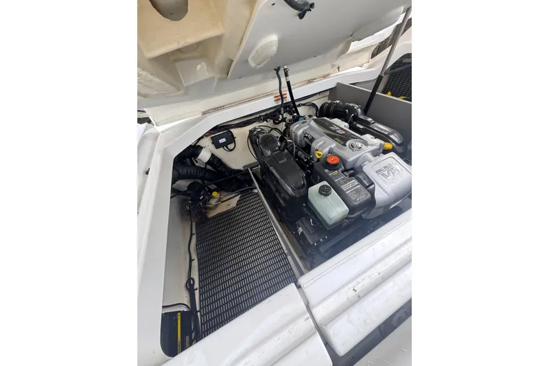 Slide: The Image of Engine compartment of 2017 Monterey 298SS Super Sport boat, showcasing V8 engine. - 18