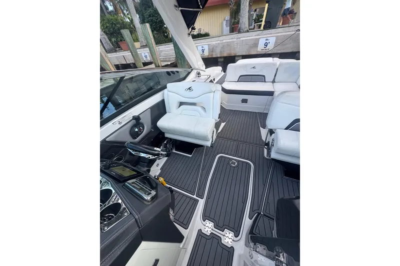 Slide: The Image of 2017 Monterey 298SS Super Sport boat interior with sleek seating and modern dashboard. - 20