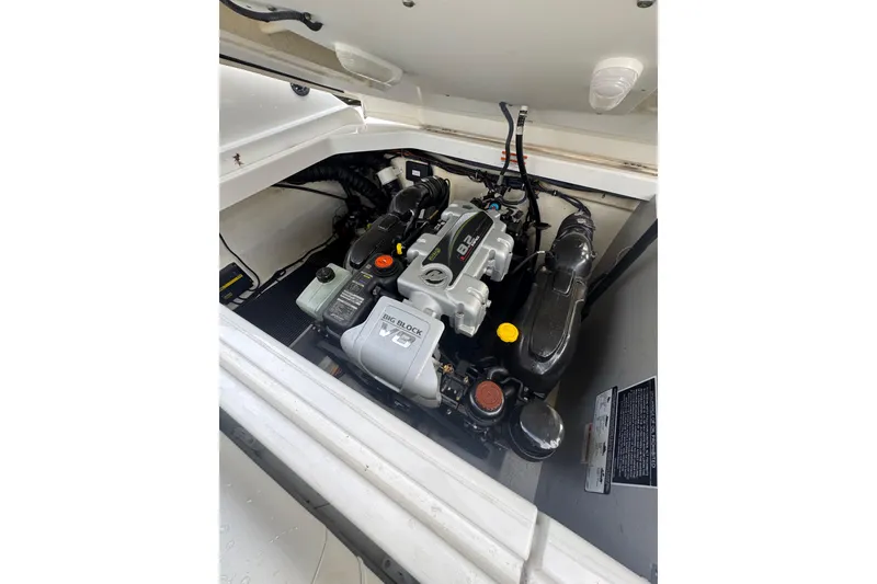 Slide: The Image of Engine compartment of a 2017 Monterey 298SS Super Sport boat, featuring a powerful engine. - 22