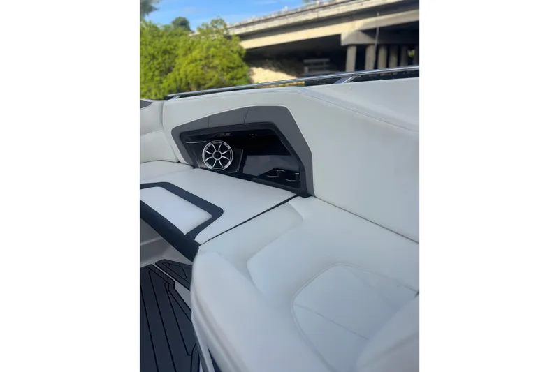 Slide: The Image of Interior of 2017 Monterey 298SS Super Sport boat with white seating and speaker. - 7