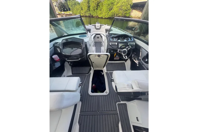 Slide: The Image of Interior view of 2017 Monterey 298SS Super Sport boat with open storage compartment. - 8