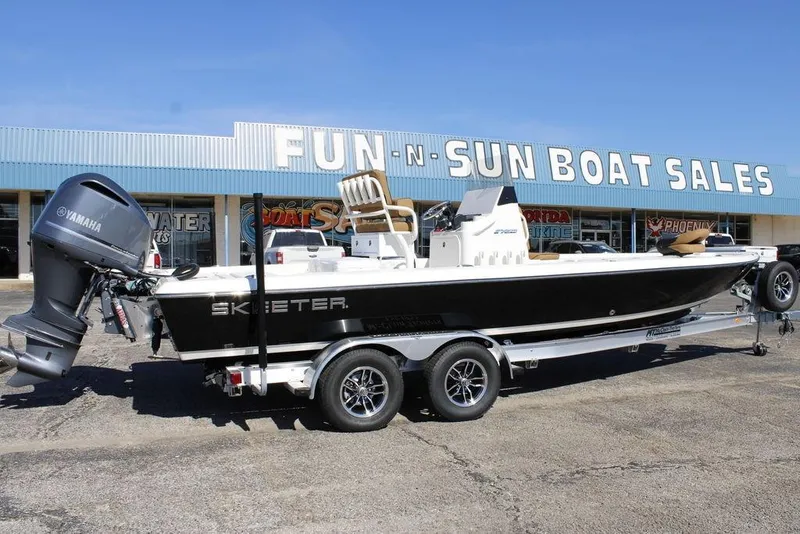 The Image of 2026 Skeeter SX241 boat on trailer at Fun-N-Sun Boat Sales dealership. - 0