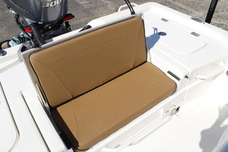 Slide: The Image of 2026 Skeeter SX241 boat with tan cushioned seating and Yamaha 300 engine. - 14
