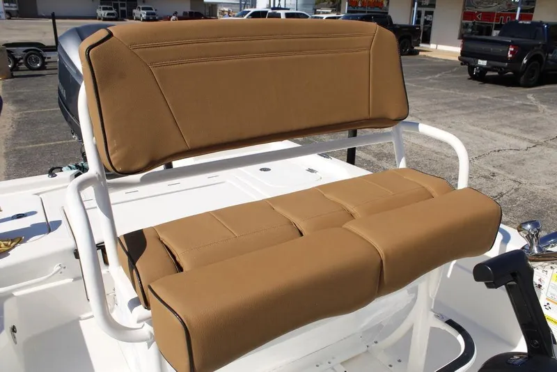 Slide: The Image of 2026 Skeeter SX241 boat with tan cushioned seating on deck. - 17