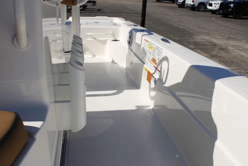 Slide: The Image of 2026 Skeeter SX241 boat interior with seating and storage compartments. - 18