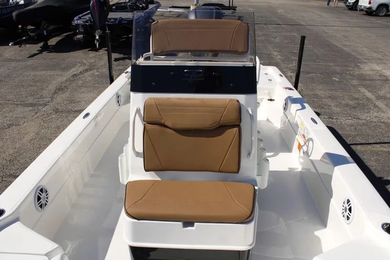 Slide: The Image of 2026 Skeeter SX241 boat interior with tan seating and sleek design. - 19