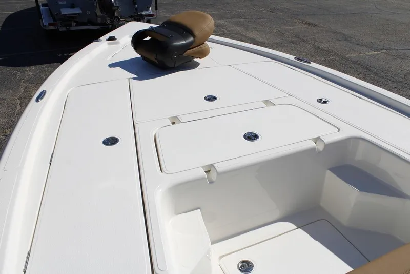 Slide: The Image of 2026 Skeeter SX241 boat deck with storage compartments and seating. - 21