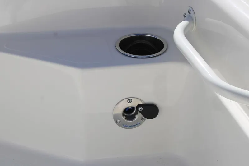 Slide: The Image of 2026 Skeeter SX241 boat washdown system with handle and drain. - 22