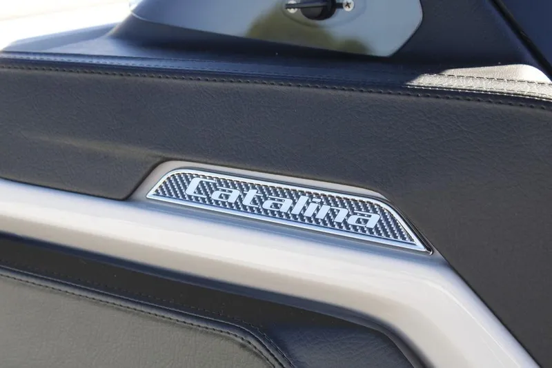 Slide: The Image of 2026 Avalon CATALINA 23 logo on sleek black leather interior. - 20