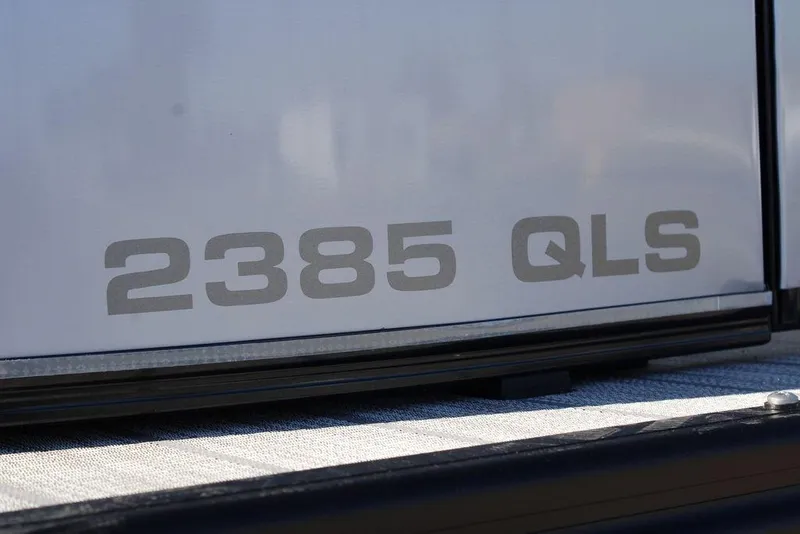 Slide: The Image of Close-up of Avalon CATALINA 23, 2026 model, displaying '2385 QLS' text. - 22