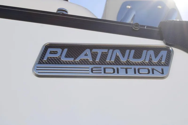 Slide: The Image of 2026 Avalon CATALINA 23 Platinum Edition badge on a sleek white surface. - 23