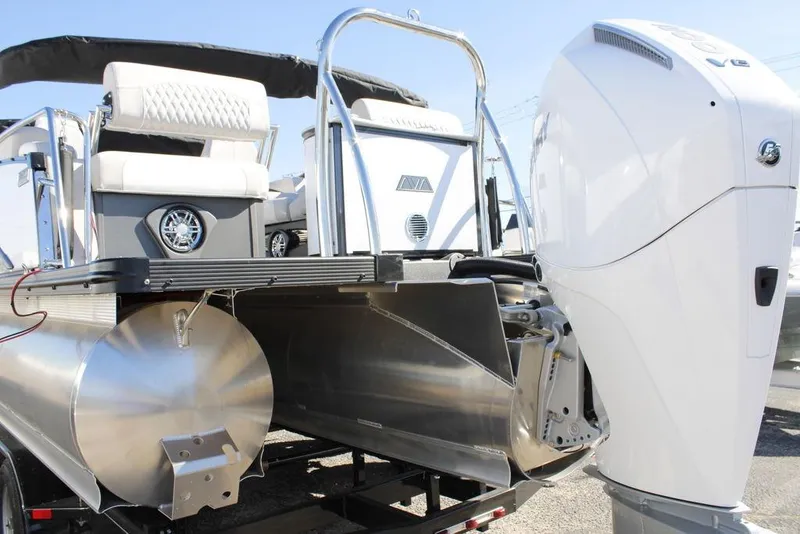 Slide: The Image of 2026 Avalon CATALINA 23 pontoon boat with modern outboard motor and sleek design. - 27