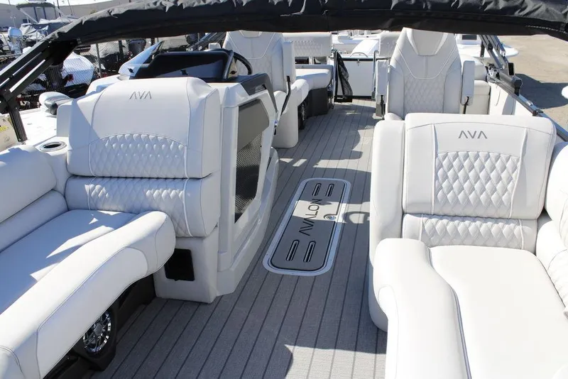 Slide: The Image of Luxurious interior of 2026 Avalon CATALINA 23 boat with plush seating and modern design. - 3