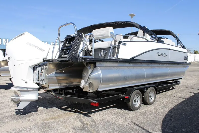 Slide: The Image of 2026 Avalon CATALINA 23 pontoon boat on trailer with Mercury outboard engine. - 31