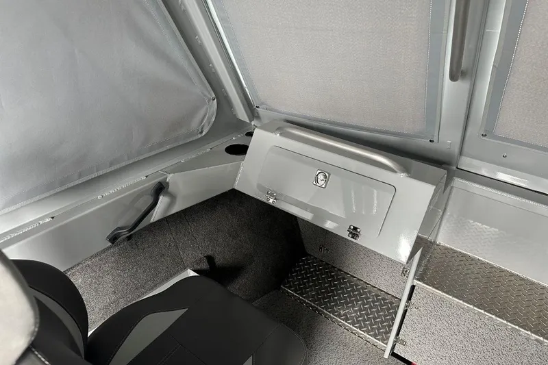 Slide: The Image of Interior of 2023 Hewescraft 240 Ocean Pro ET HT boat, featuring seating and storage. - 8