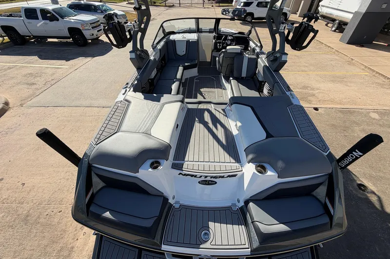 Slide: The Image of 2020 Nautique Super Air Nautique G23 boat interior, featuring spacious seating and modern design. - 11