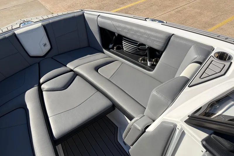 Slide: The Image of 2020 Nautique Super Air Nautique G23 boat interior with luxurious gray seating. - 17