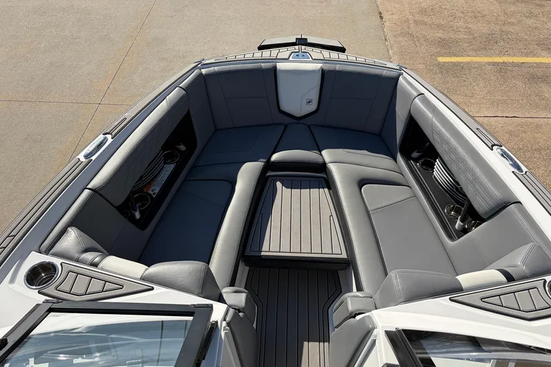 Slide: The Image of 2020 Nautique Super Air Nautique G23 boat interior with luxurious gray seating. - 23