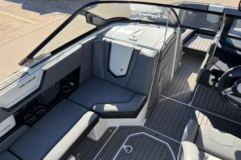 Slide: The Image of 2020 Nautique Super Air Nautique G23 interior with sleek seating and modern design. - 26