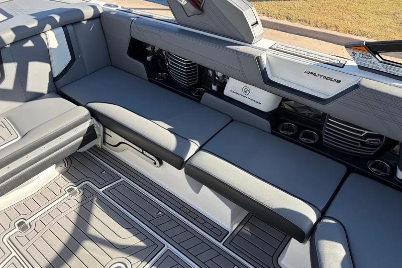 Slide: The Image of 2020 Nautique Super Air Nautique G23 interior with gray seating and modern design. - 30