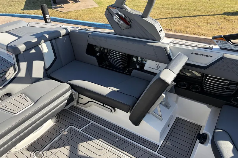 Slide: The Image of 2020 Nautique Super Air Nautique G23 interior with gray seating and modern design. - 31