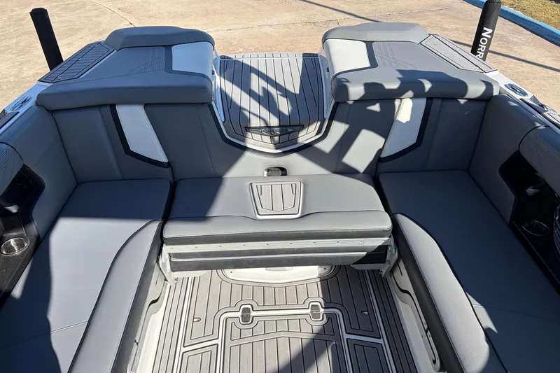 Slide: The Image of 2020 Nautique Super Air Nautique G23 interior with gray seating and deck. - 33